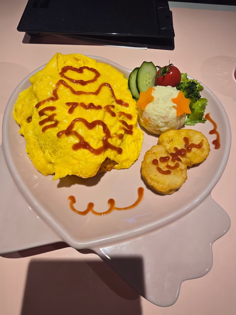 Omurice with ketchup art at @Home Cafe in Akihabara, Tokyo