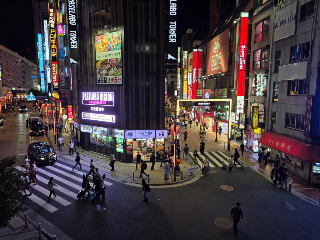 Crowded Kabukicho street at night in Shinjuku, Tokyo