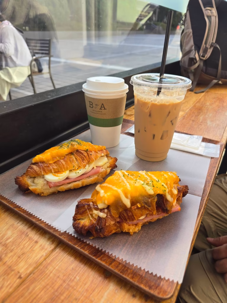Eggslut breakfast sandwich and coffee at Eggslut in Shinjuku, Tokyo